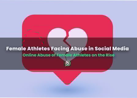 A broken heart icon inside a social media notification bubble, symbolizing the rise of online abuse targeting female athletes